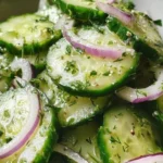 Fresh cucumber salad with herbs and dressing