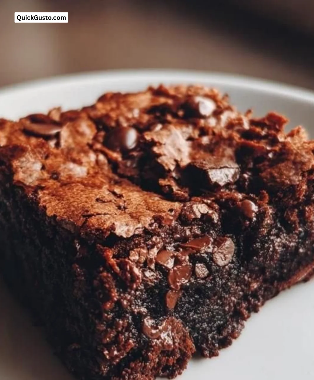 Delicious homemade date brownies on a white plate