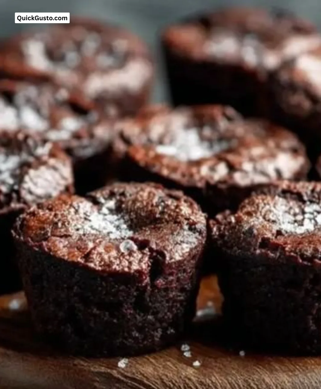 Fudgy chocolate brownie bites on a plate, perfect for dessert lovers.