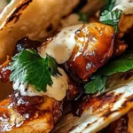 Garlic Butter Honey BBQ Chicken Tacos served with fresh toppings