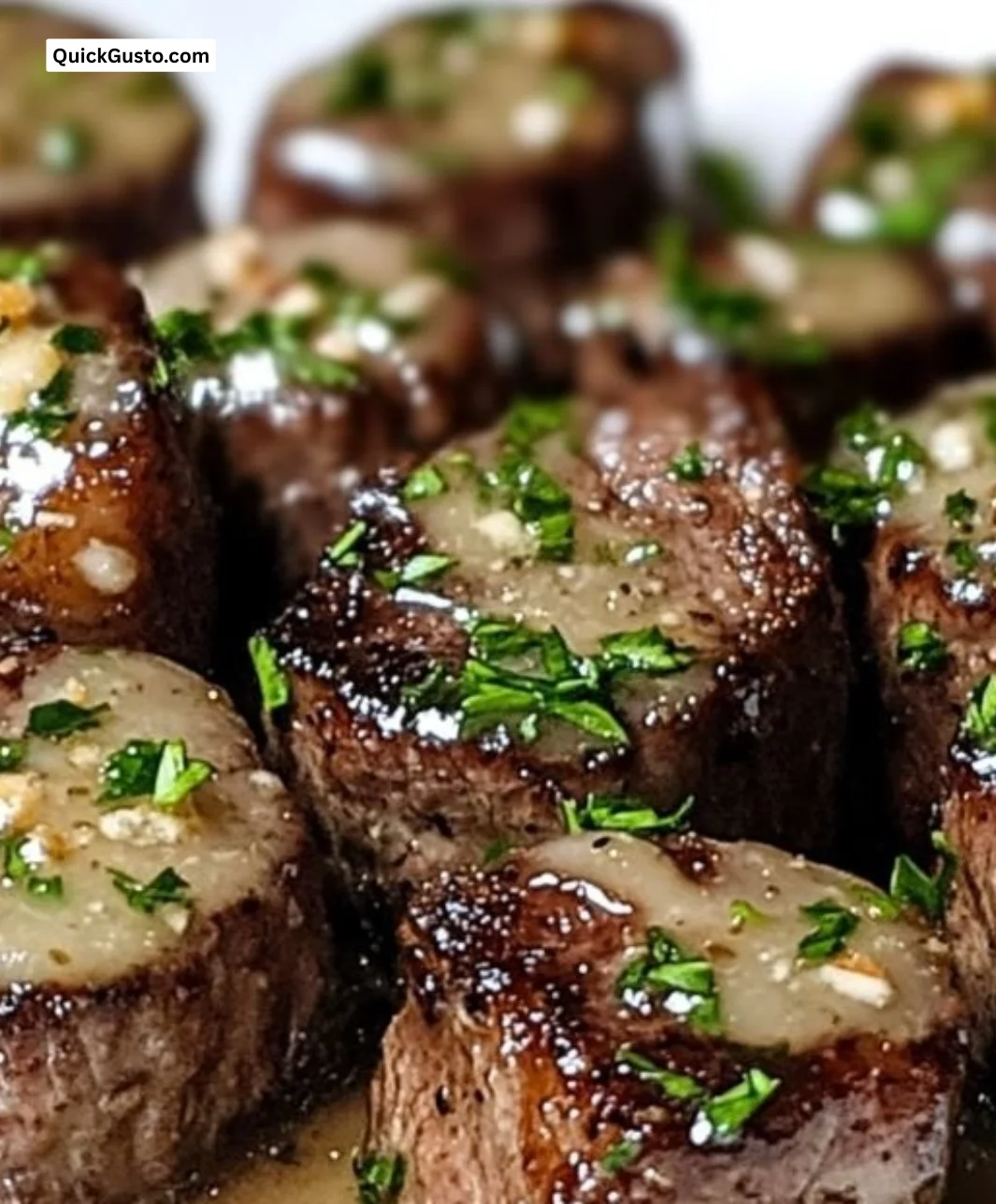 Garlic butter steak bites served with parmesan cream sauce