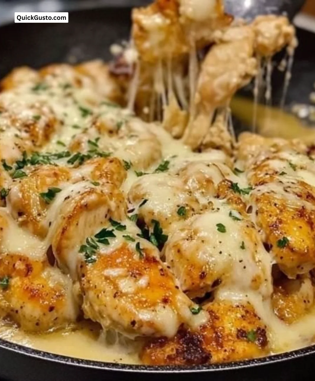Delicious Garlic Parmesan Chicken Skillet served with herbs and vegetables