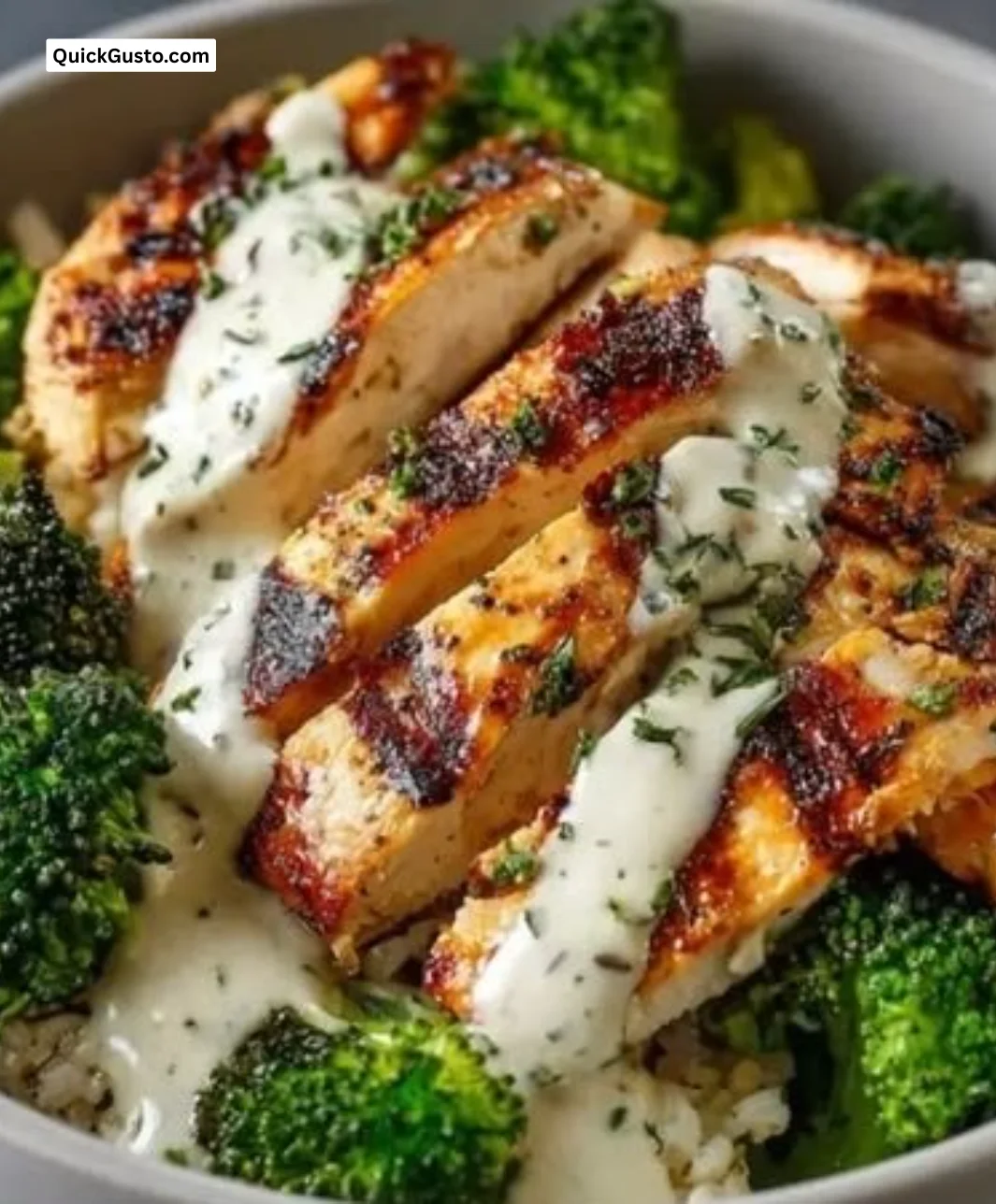 Healthy grilled chicken broccoli bowls with creamy garlic sauce