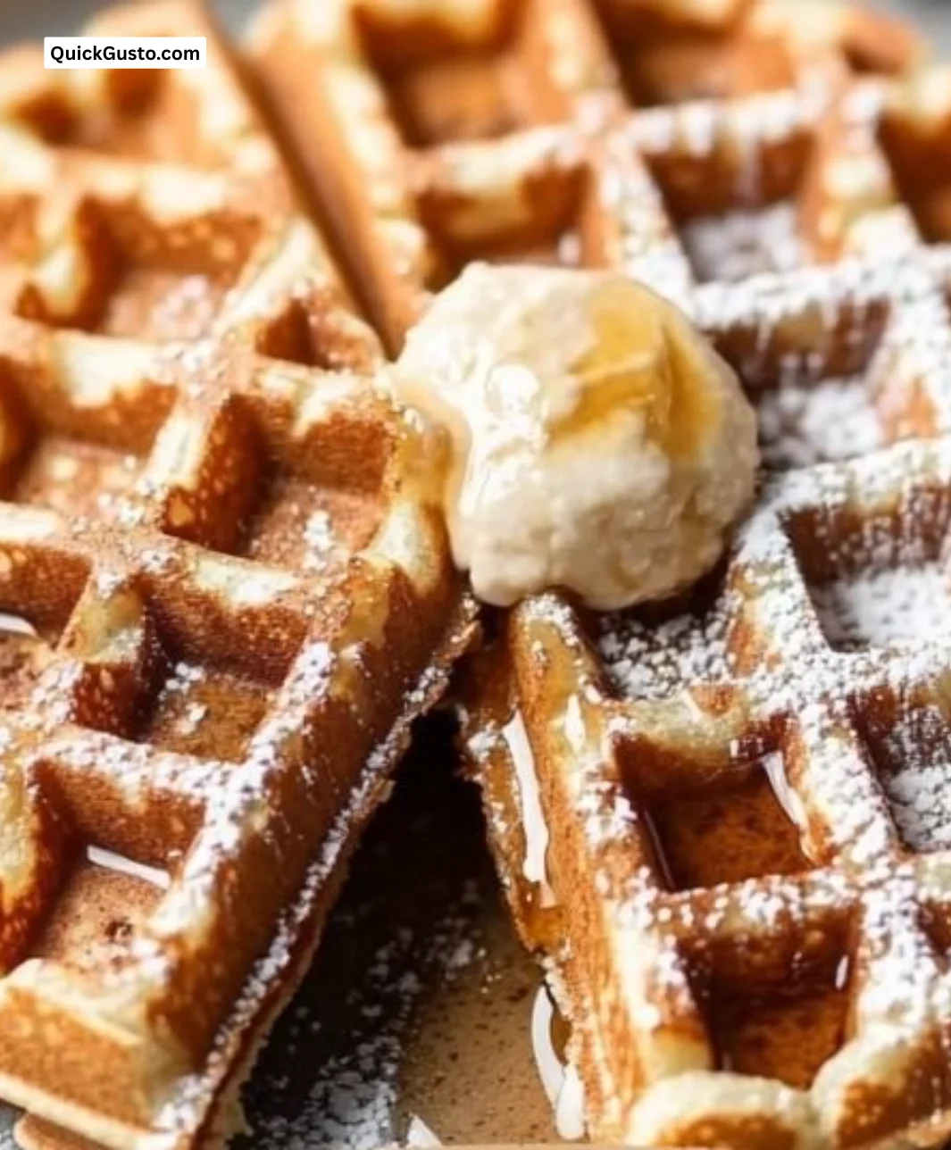 Plate of fluffy high-protein waffles topped with fresh berries and syrup