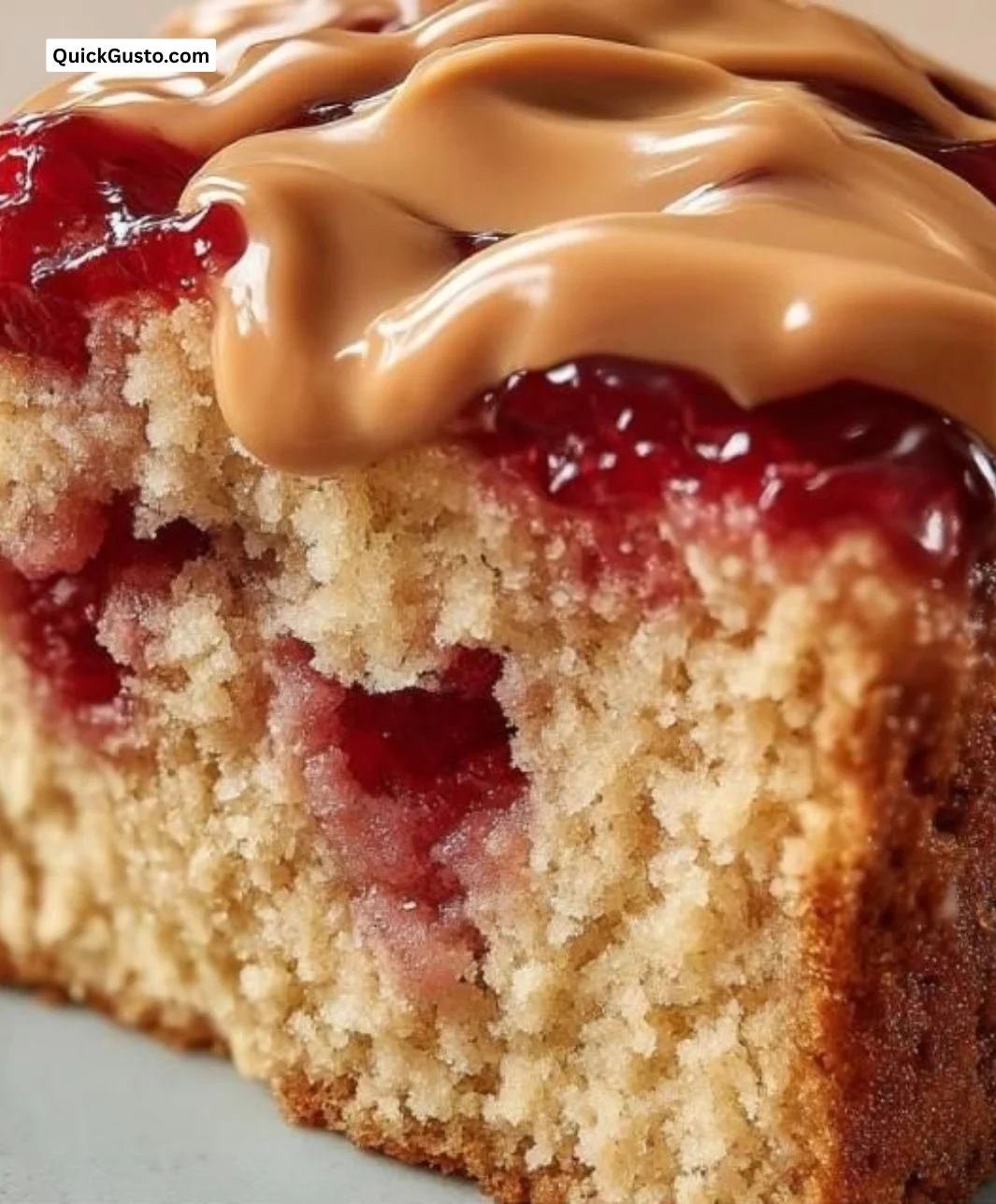 Irresistible peanut butter and jelly cake with layers of flavor and texture.