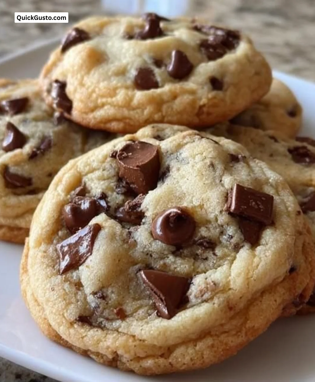 Soft chocolate chip cookies fresh out of the oven, ready to be enjoyed.