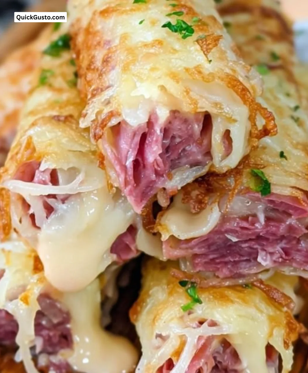 Plate of Keto Crispy Reuben Roll-Ups with garnishes