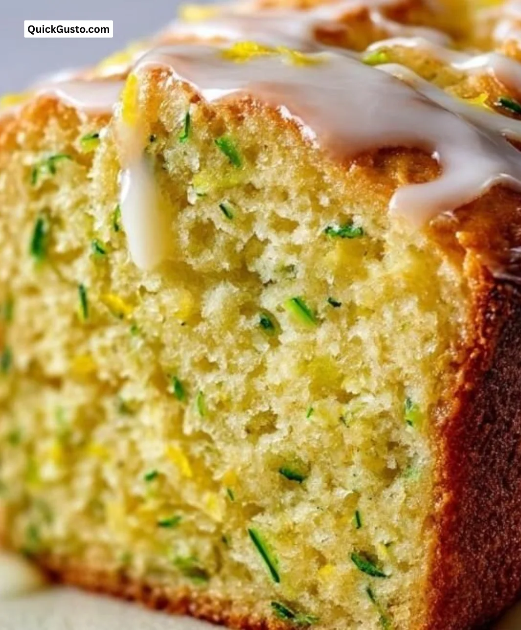 Loaf of lemon zucchini bread showcasing its moist texture and zesty flavor
