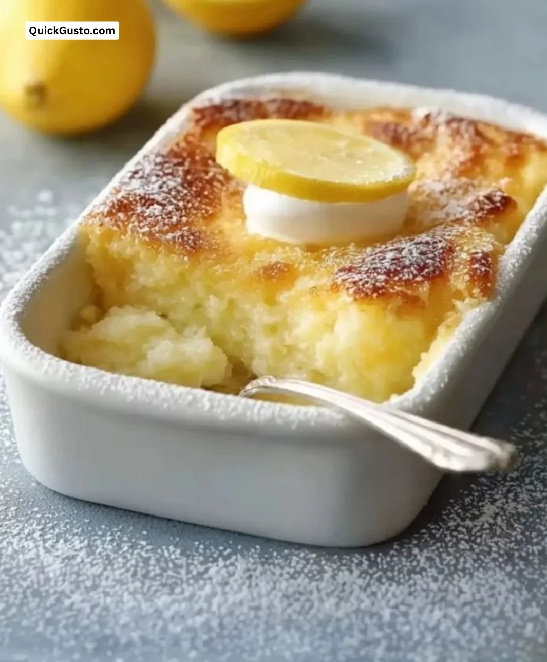 Delicious one-bowl lemon dessert topped with fresh lemon zest and berries.