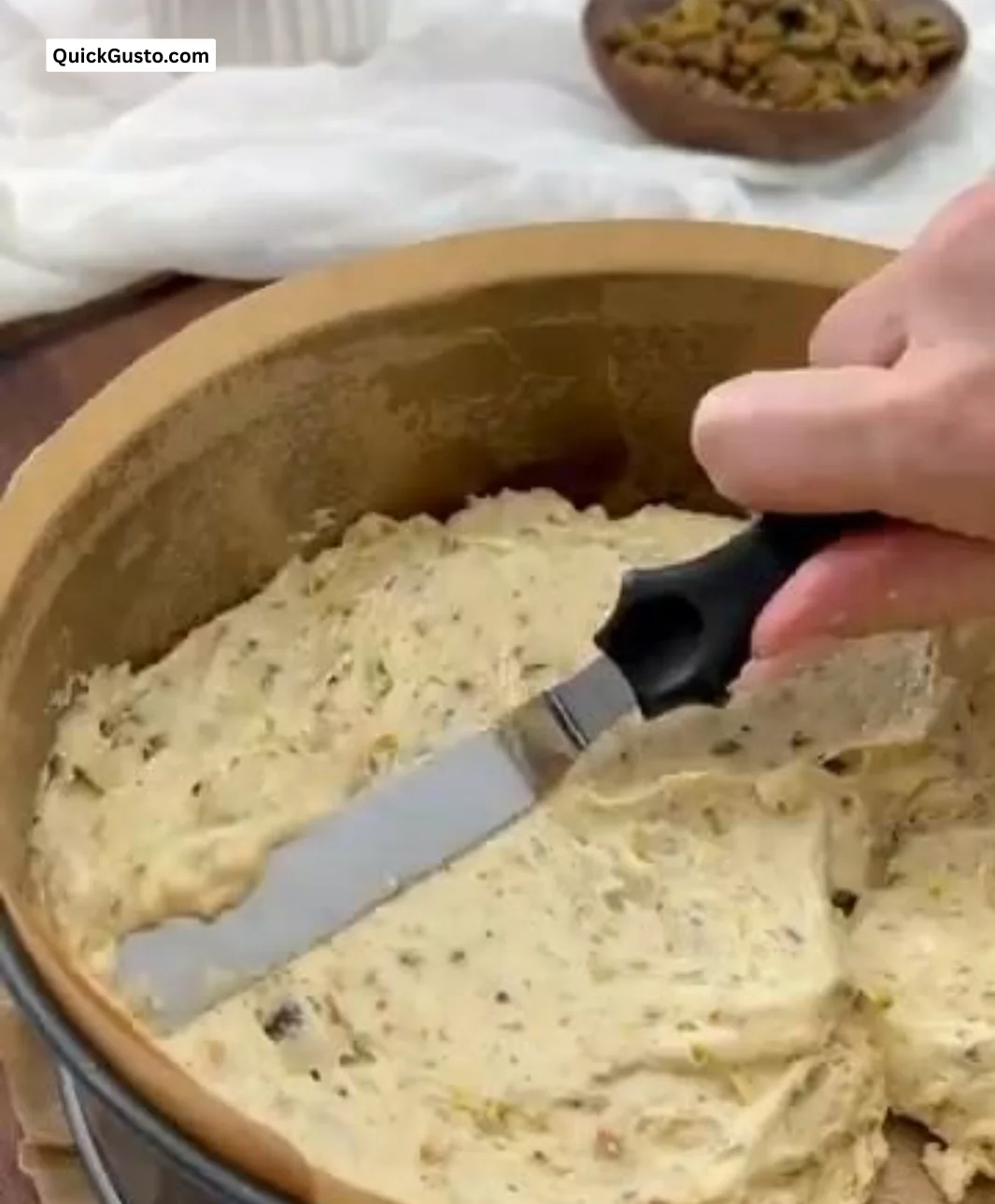 Delicious Pistachio Coffee Cake topped with creamy frosting