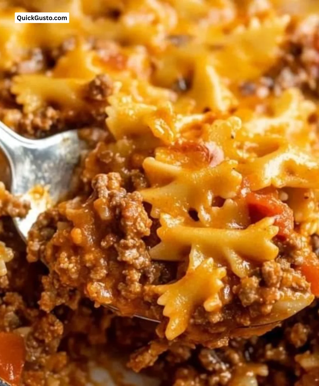 Delicious Sloppy Joe Pasta Casserole topped with melted cheese