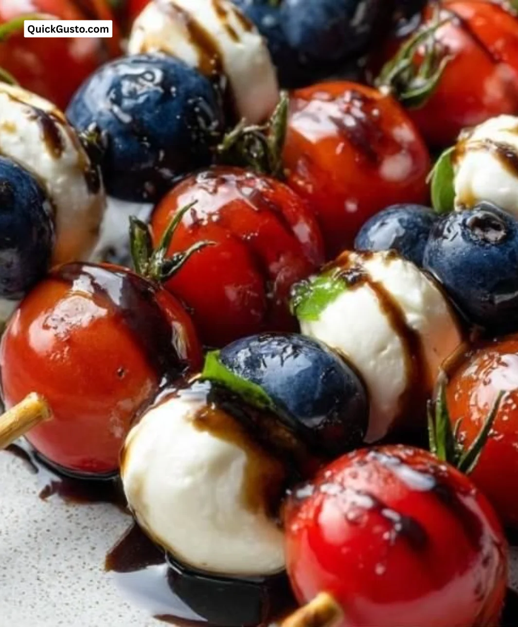 Red, White & Blue Caprese Skewers with tomatoes, mozzarella, and basil