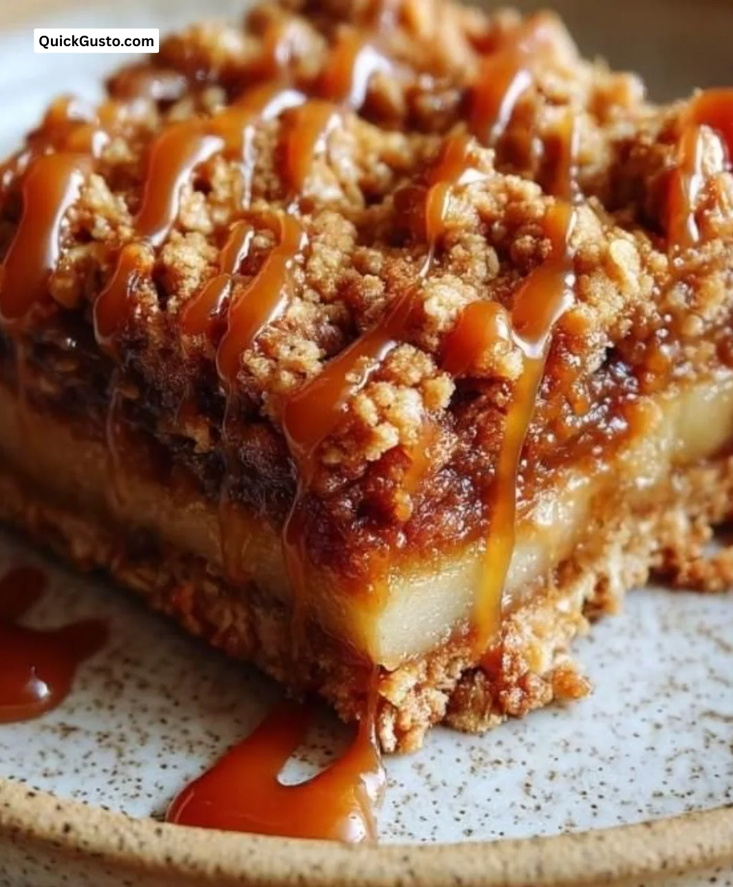 Delicious salted caramel apple crumble bars with a crunchy topping