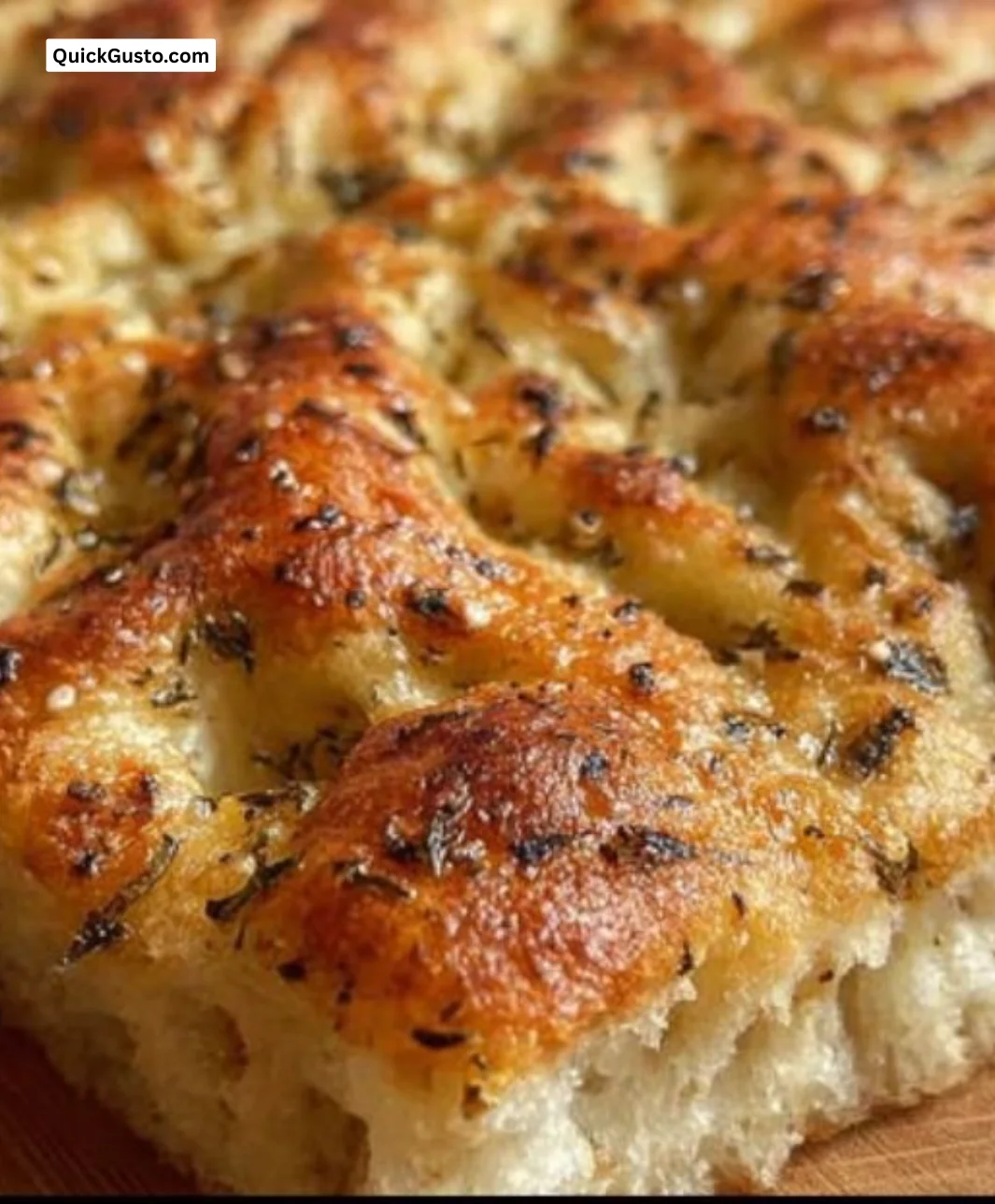 Homemade Same Day Focaccia bread with herbs and olive oil, perfect for meals.
