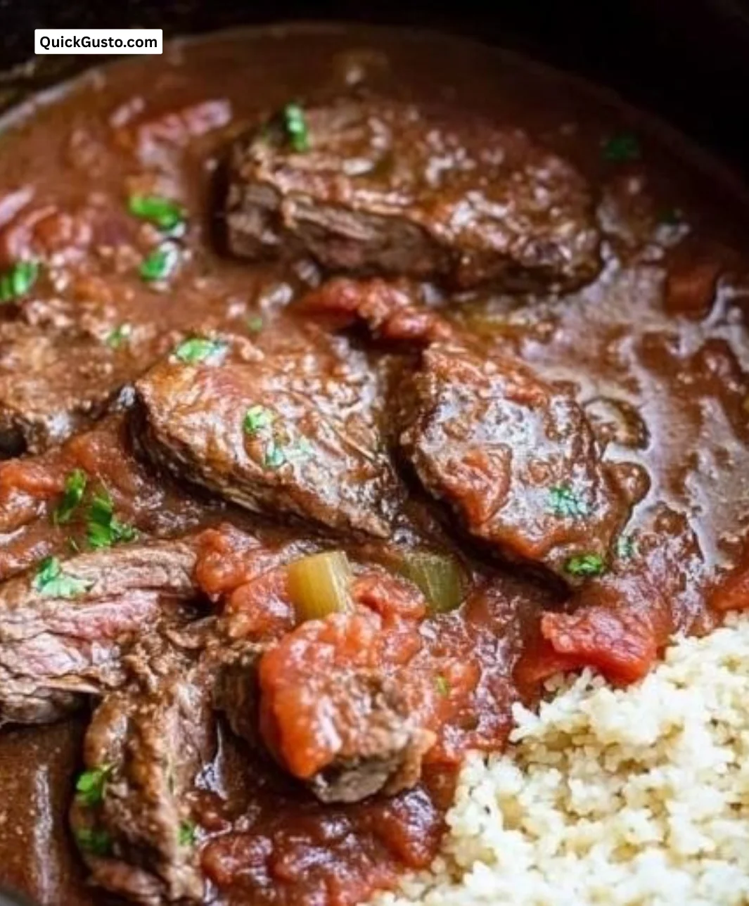 Delicious slow cooker Swiss steak served with vegetables and gravy