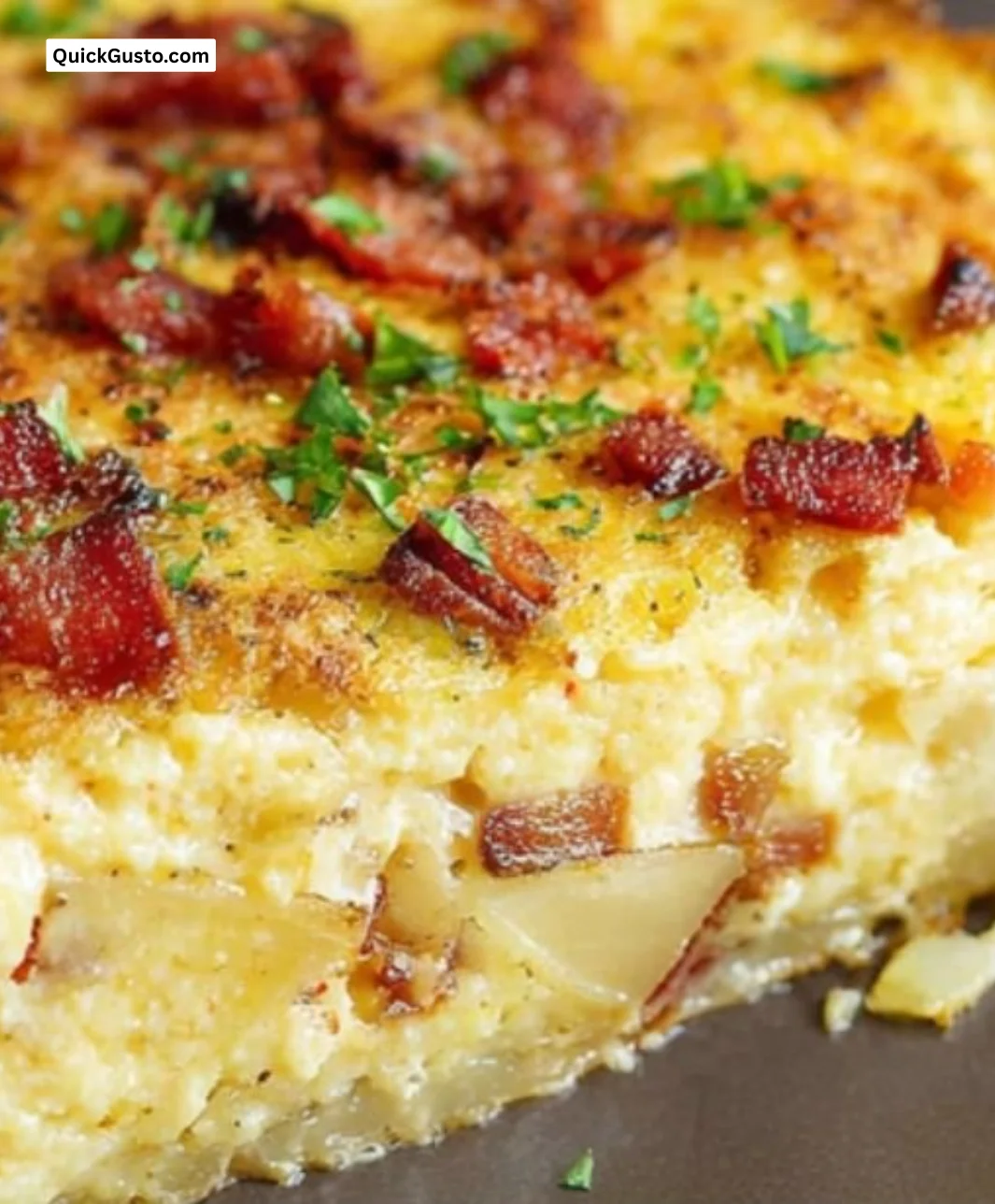 Smashed potato crusted quiche topped with vegetables and cheese