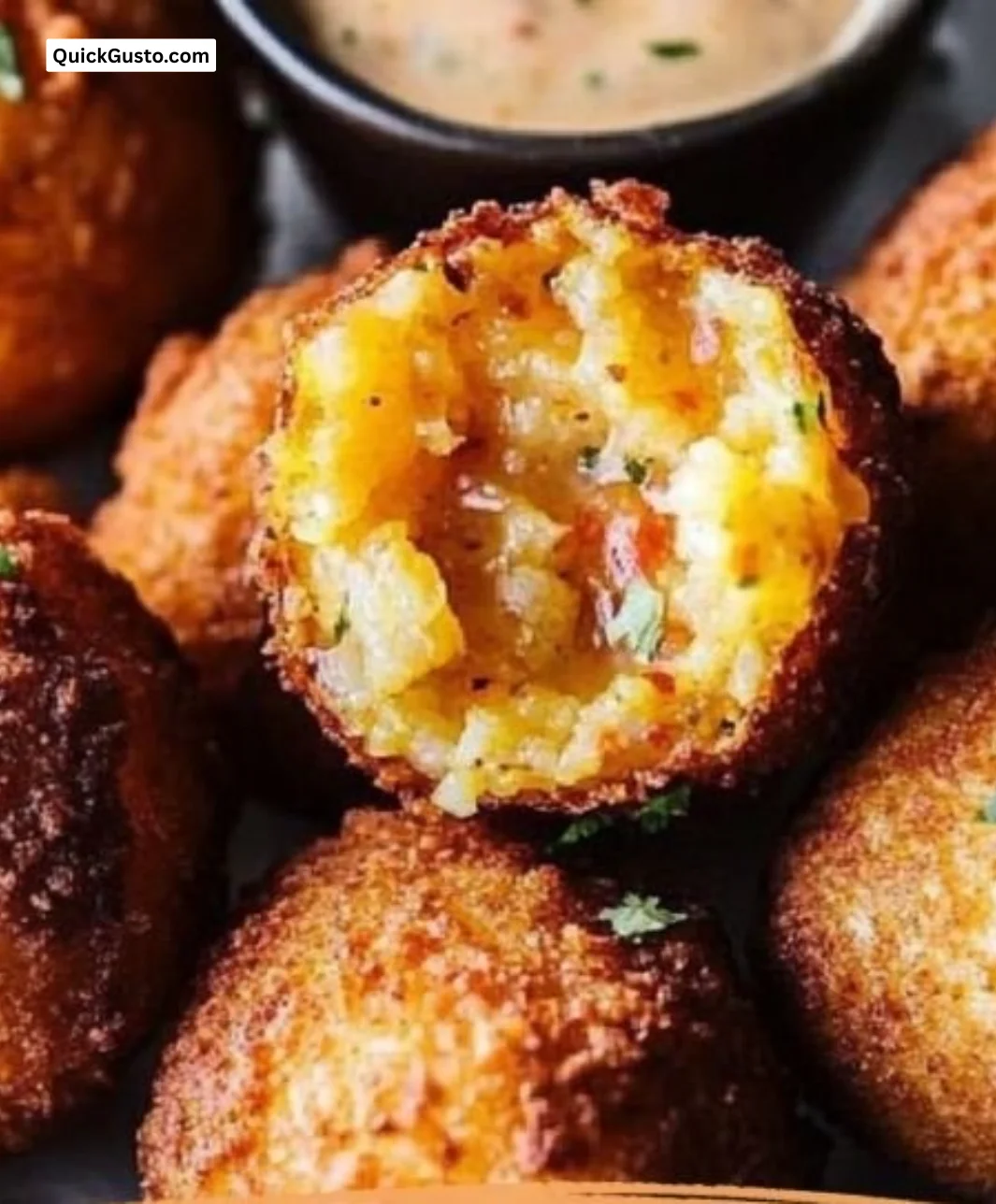 Spicy crawfish hush puppies served with Creole dipping sauce