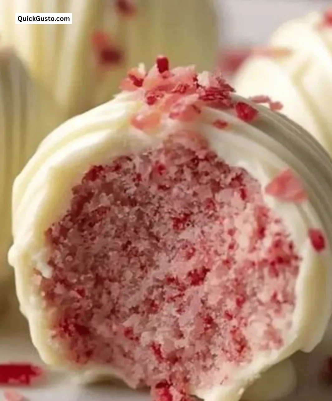 Delicious white chocolate strawberry truffles arranged on a plate