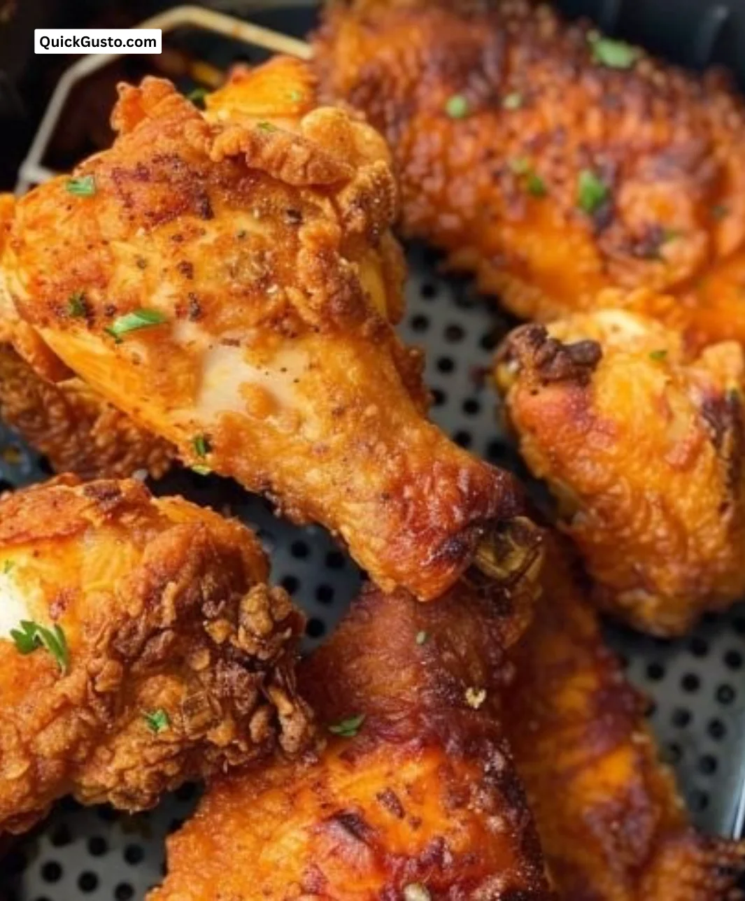 Delicious air fryer fried chicken served on a plate with dipping sauce