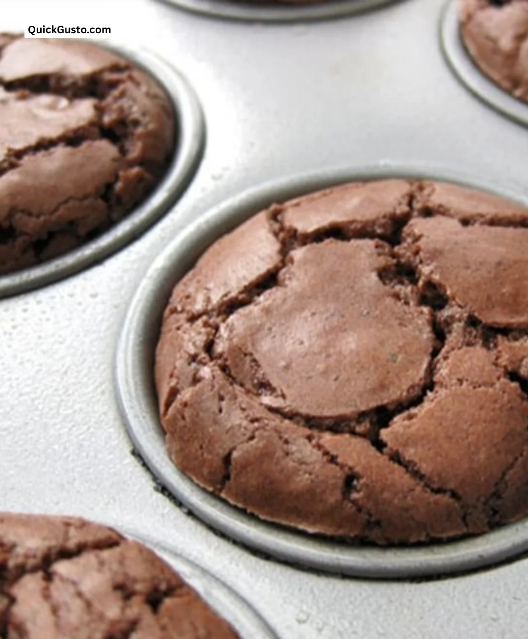 Delicious Almond Chocolate Brownies topped with crumbled almonds