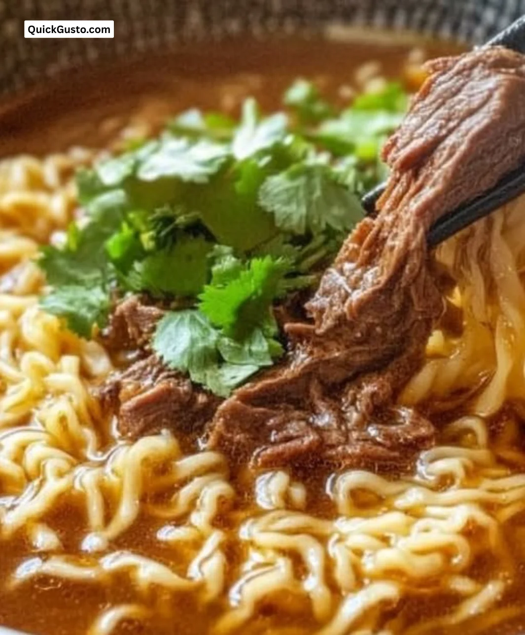 Delicious bowl of Birria Ramen topped with fresh ingredients and spices.