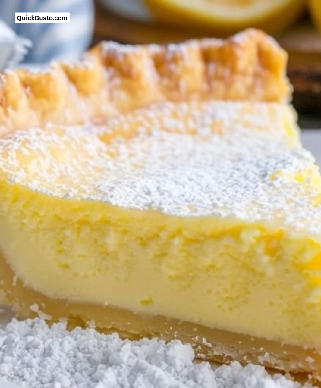 Delicious Blender Lemon Pie served in a slice with fresh lemon garnish.