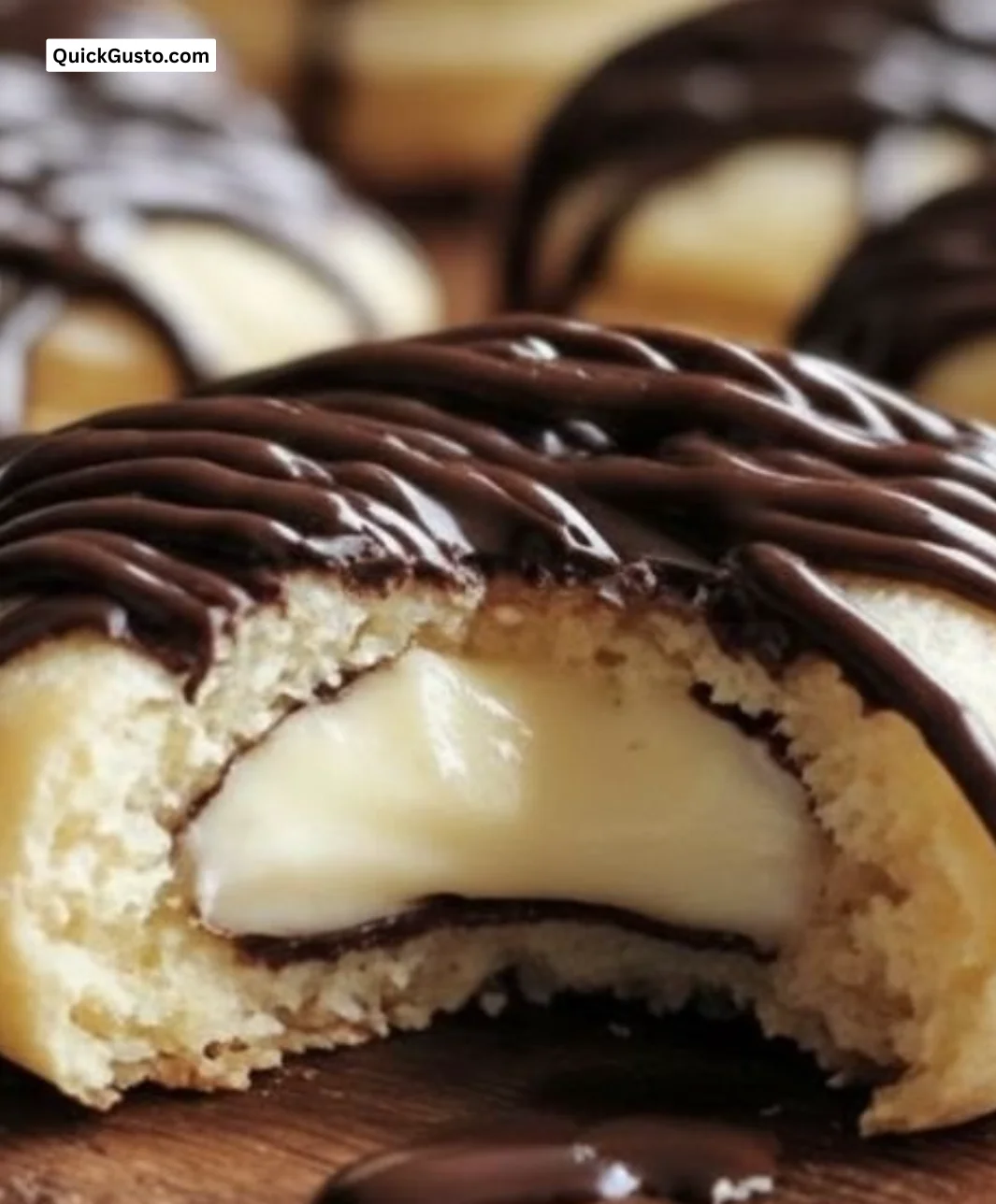 Boston Cream Pie Cookie Bites with chocolate ganache filling on a plate