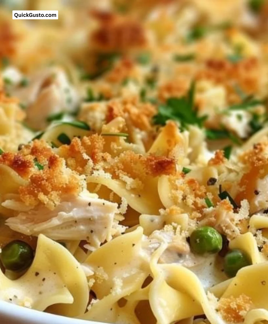 Delicious Chicken Noodle Casserole dish served with fresh herbs