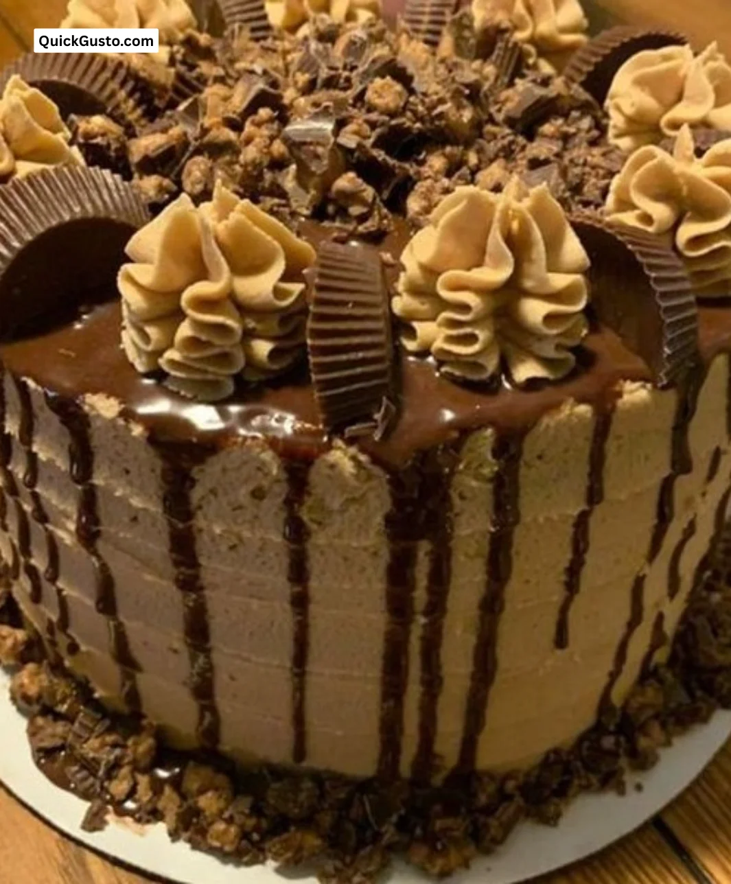 Decadent Chocolate Peanut Butter Cake with ganache and peanut butter frosting