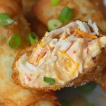Delicious crab cake egg rolls served with dipping sauce.