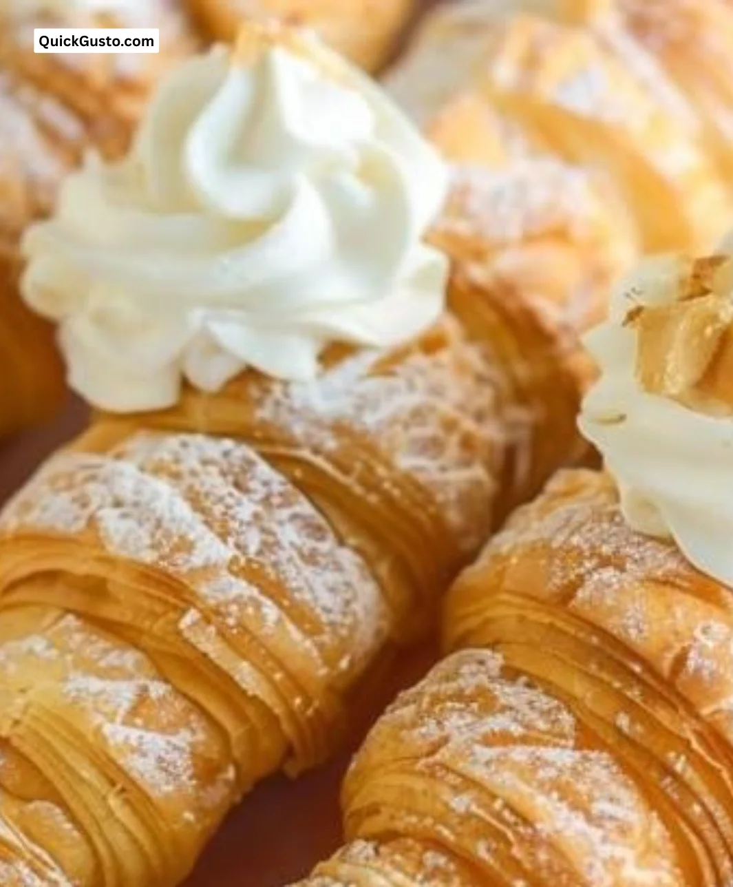 Delicious cream horns pastry filled with sweet cream, perfect for dessert lovers.
