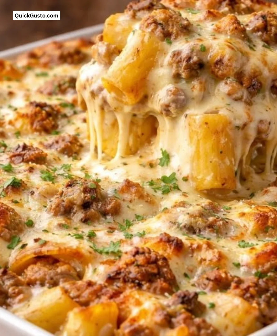Creamy Ground Beef Alfredo Pasta served in a bowl, garnished with parsley.