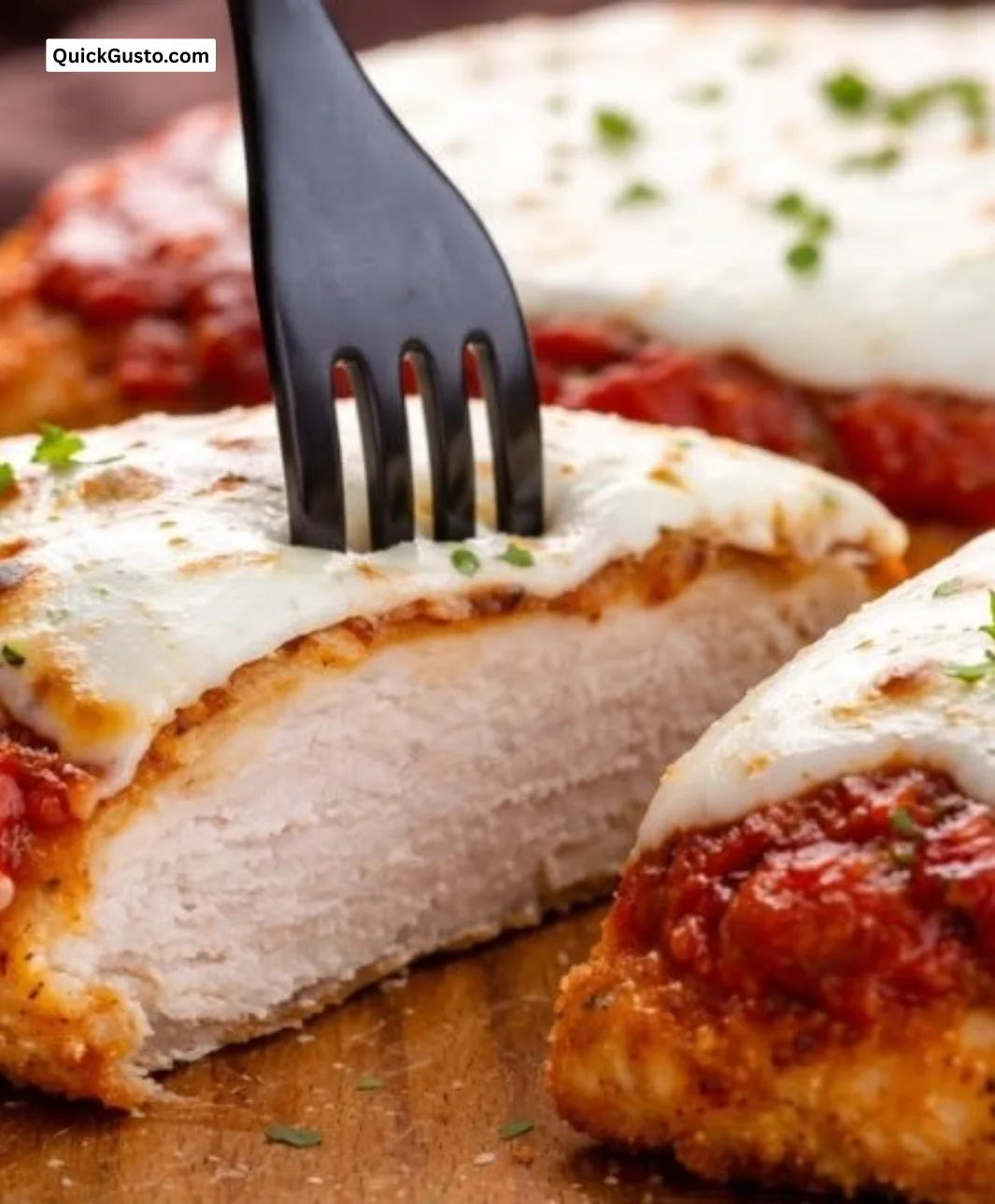 Creamy Tomato Basil Chicken Breast served with fresh basil garnish