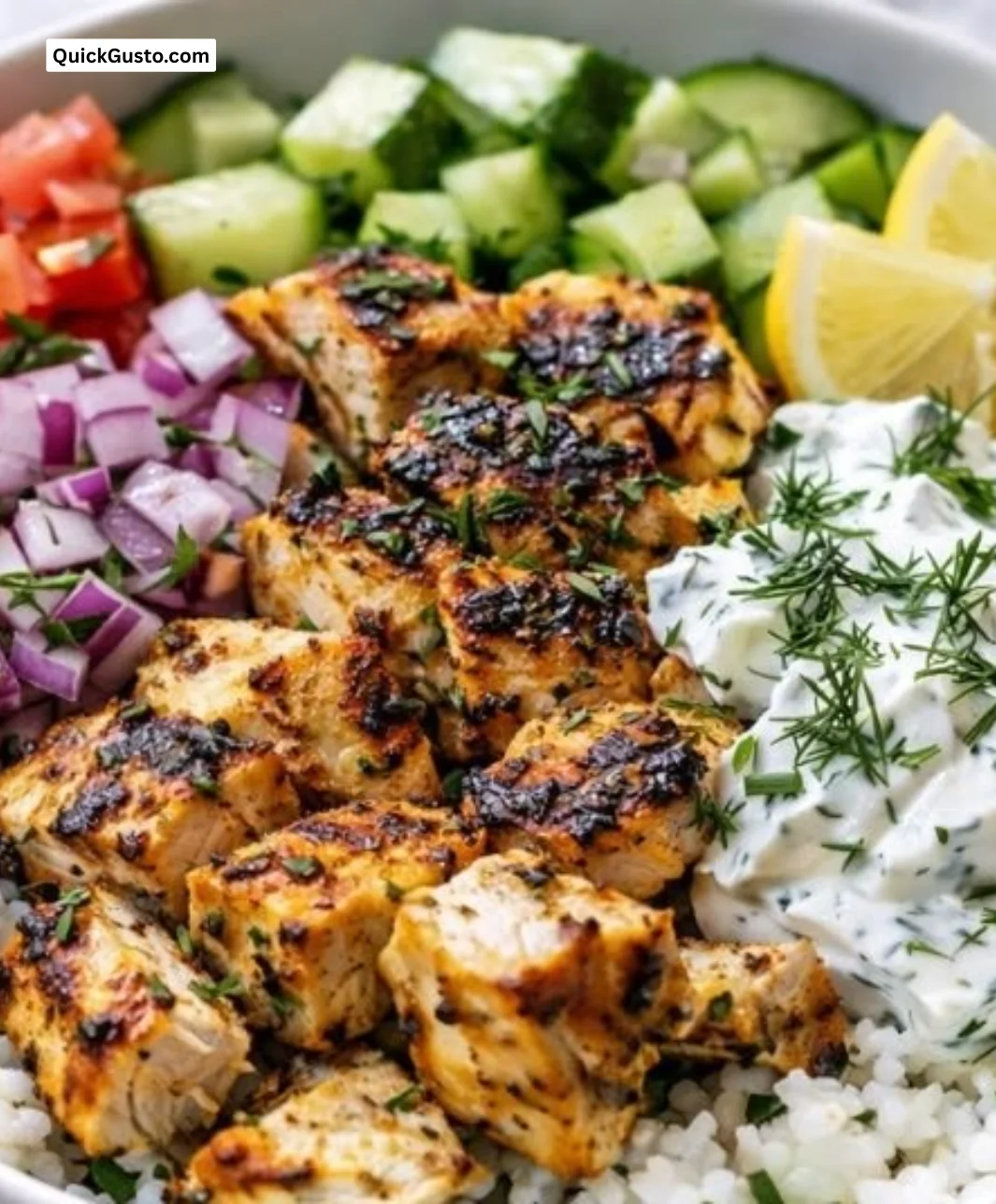 Healthy lemon dill chicken bowl with vegetables and quinoa.