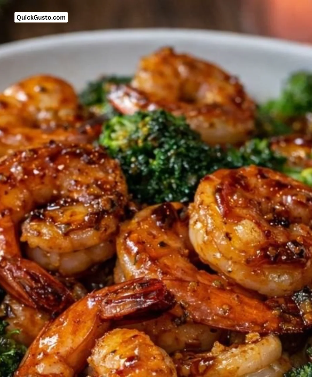 Delicious honey garlic shrimp served with vegetables on a plate
