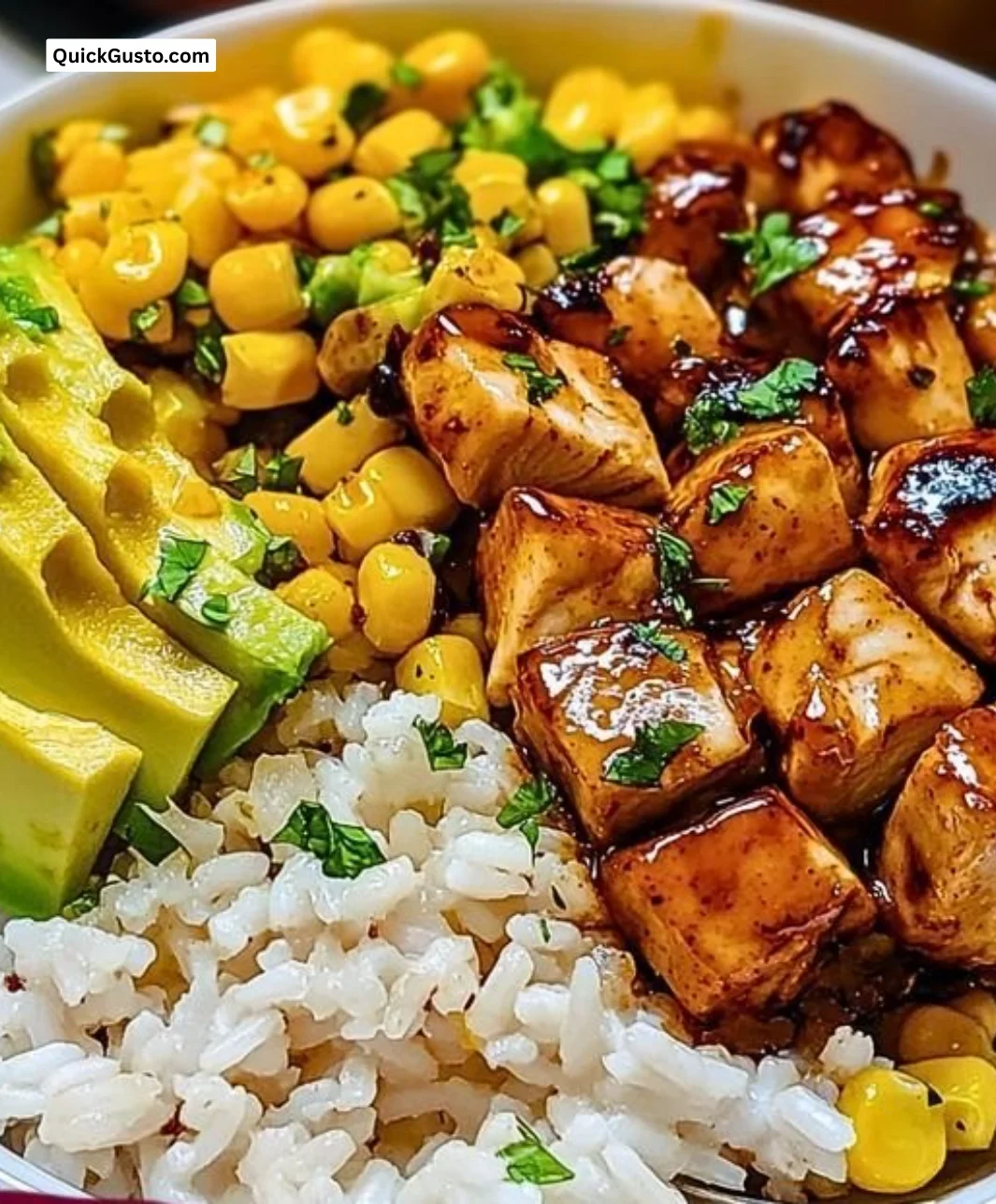 Delicious Honey Chipotle Chicken Rice Bowl topped with vibrant vegetables