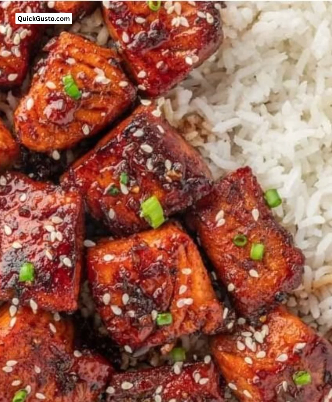 Delicious honey glazed salmon bites served on a platter.