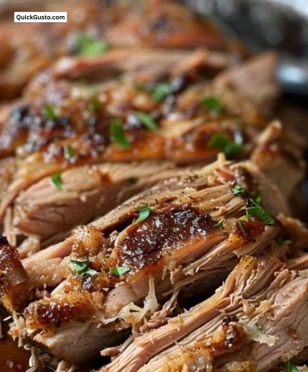 Delicious Kalua Pork served on a plate, showcasing tender meat and Hawaiian flavors.