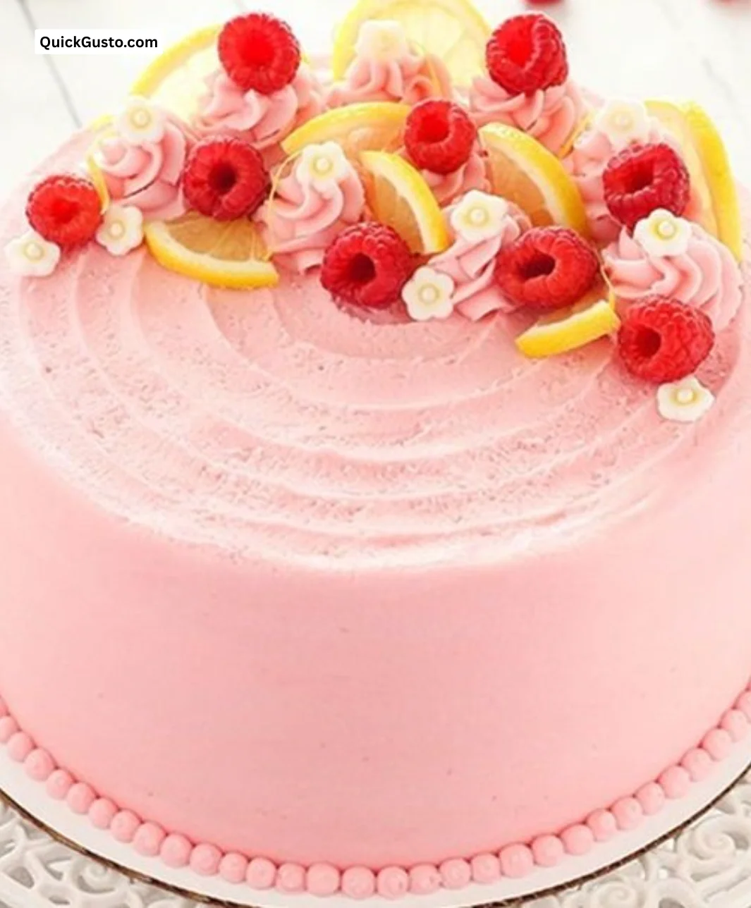 Lemon Raspberry Layer Cake with layers of lemon and raspberry frosting