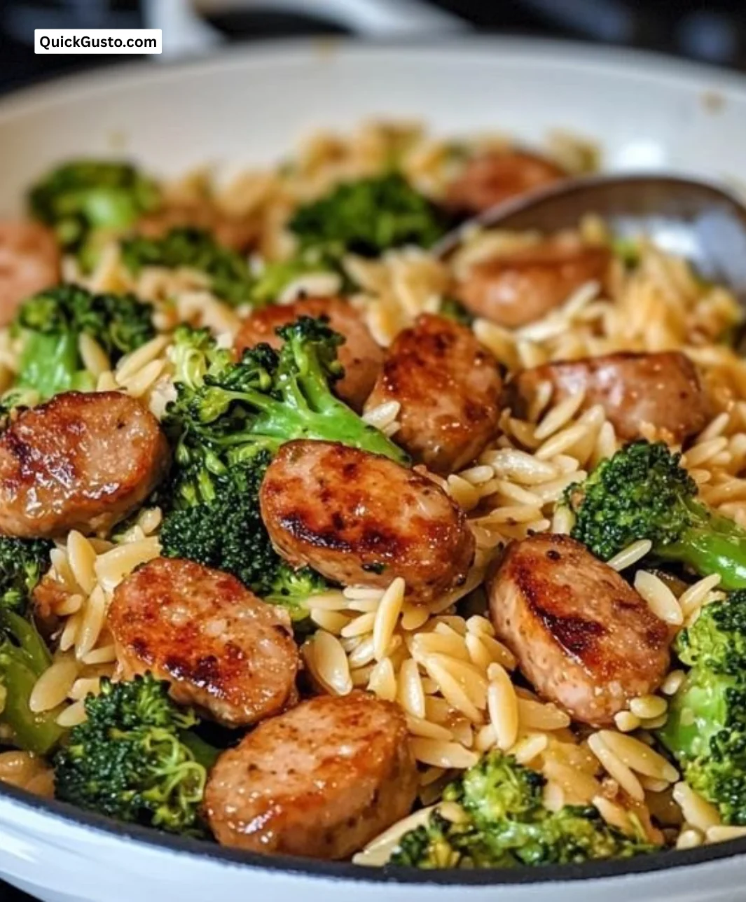 One-Pan Chicken Sausage and Broccoli Orzo dish in a skillet