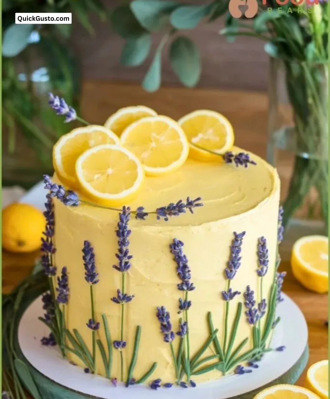 A beautiful pink spring birthday cake adorned with flowers