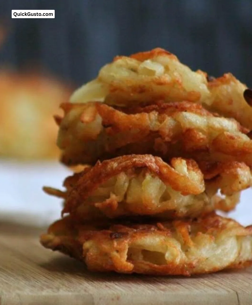 Golden brown potato pancakes served with sour cream and chives