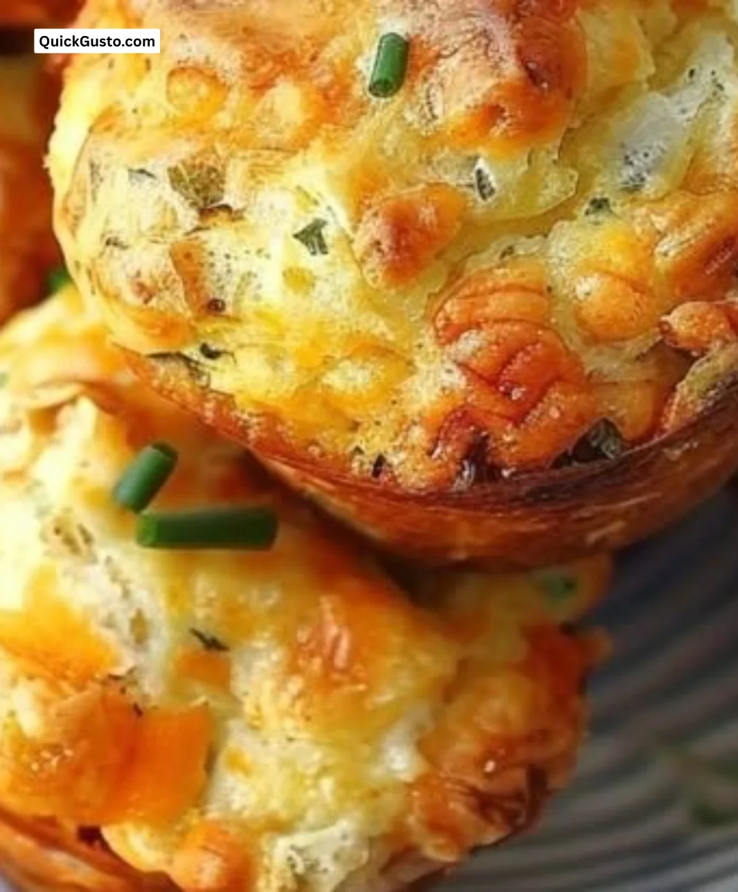 Freshly made Sausage Egg Muffins served on a plate for a hearty breakfast.