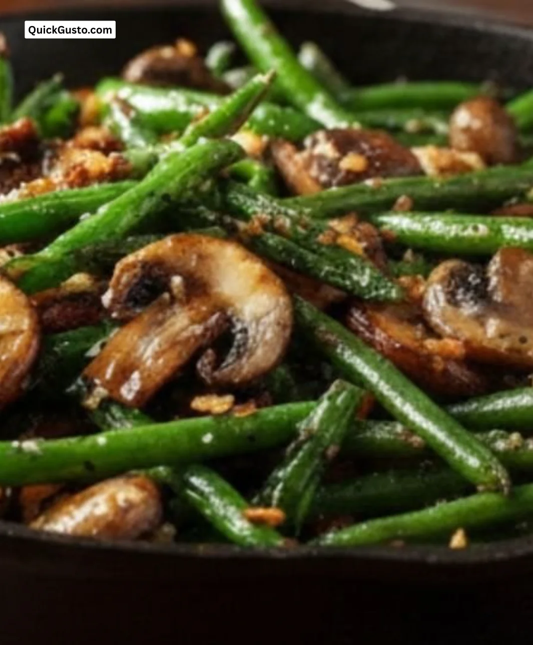 Plate of sautéed mushrooms and green beans, a delicious weeknight meal.