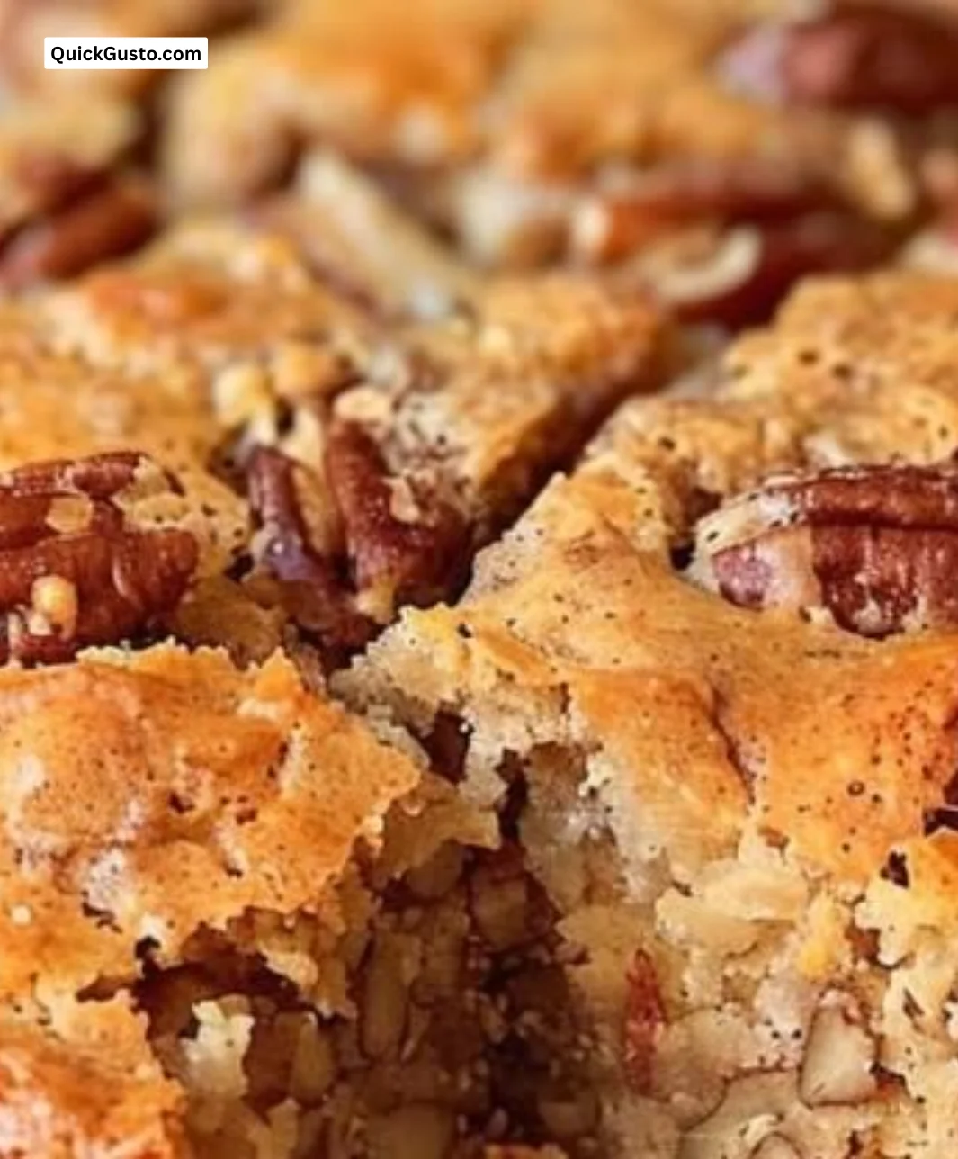Sweet Alabama Pecan Bread loaf with pecans on a wooden table