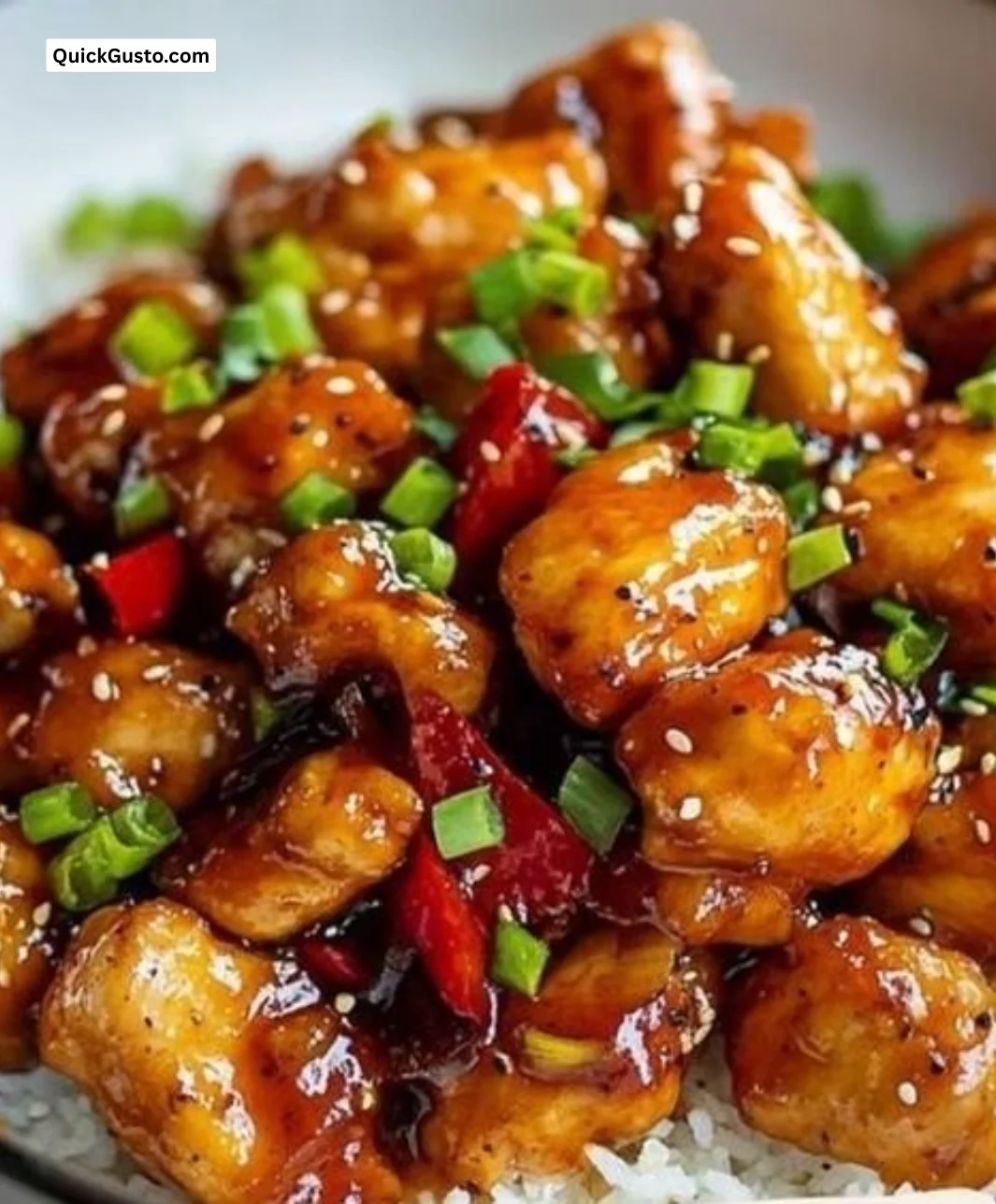 Delicious Sweet Chili Chicken served with fresh vegetables.
