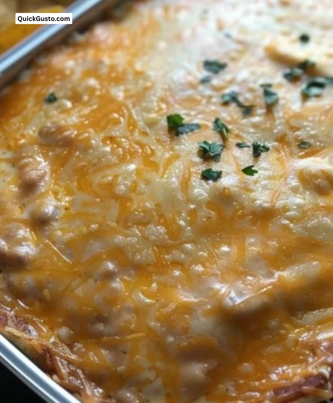 Delicious Texas Trash Dip served in a bowl with tortilla chips