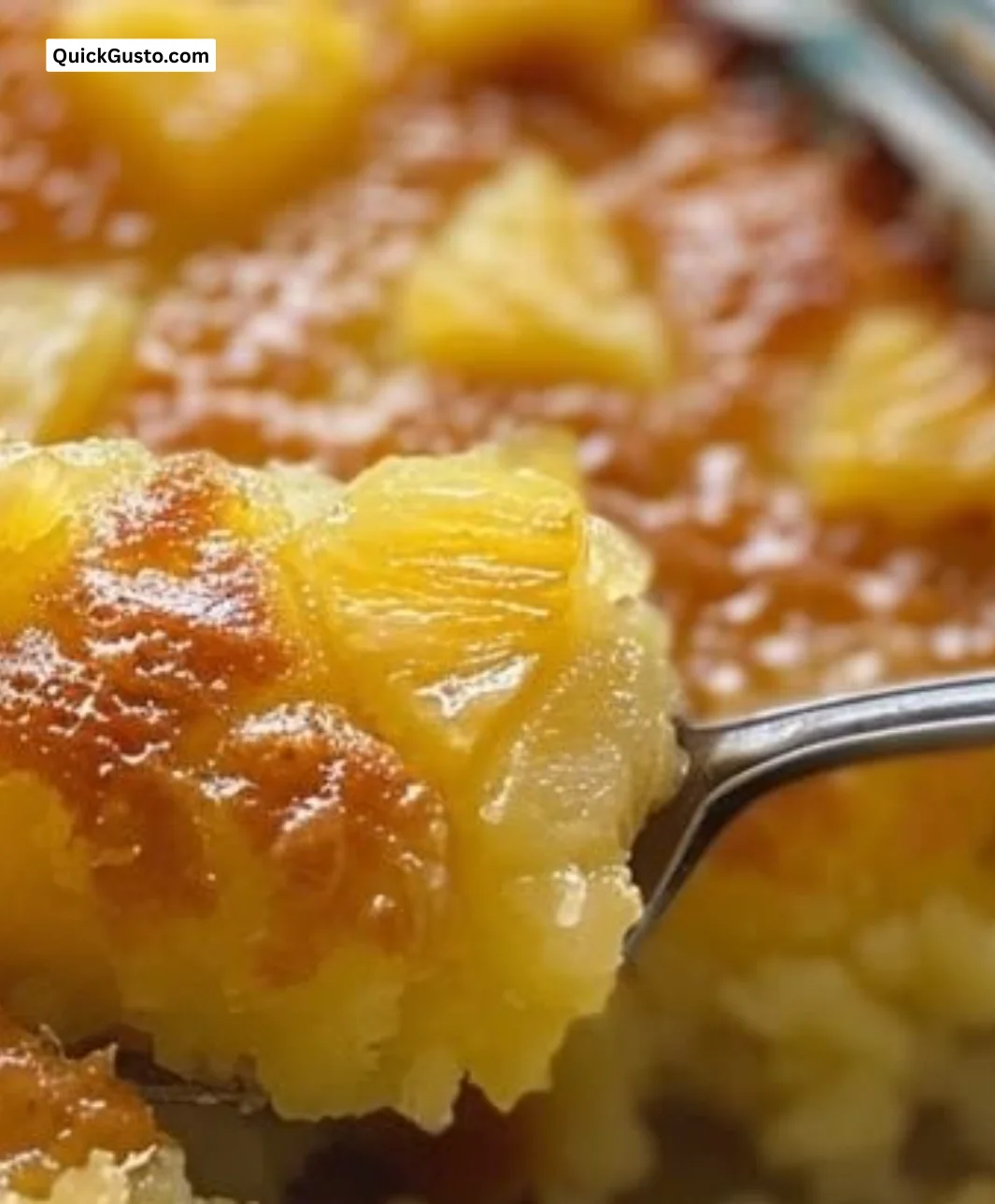 Delicious pineapple bake served in a baking dish, garnished with fresh pineapple slices