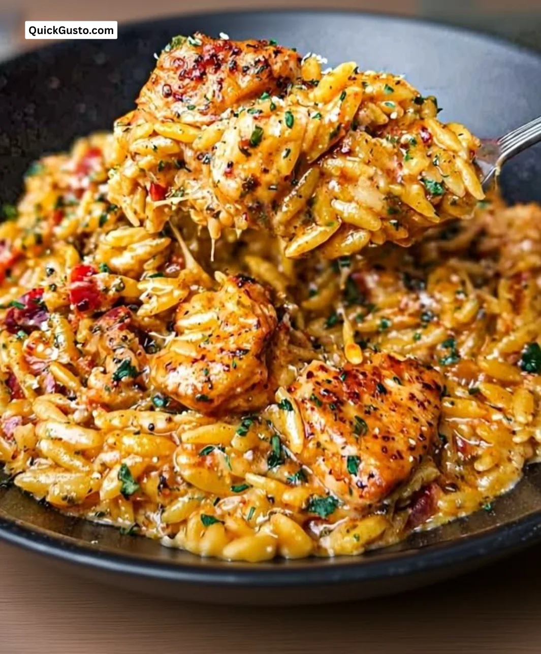 One-Pot Cajun Chicken Alfredo Orzo with creamy sauce and spices