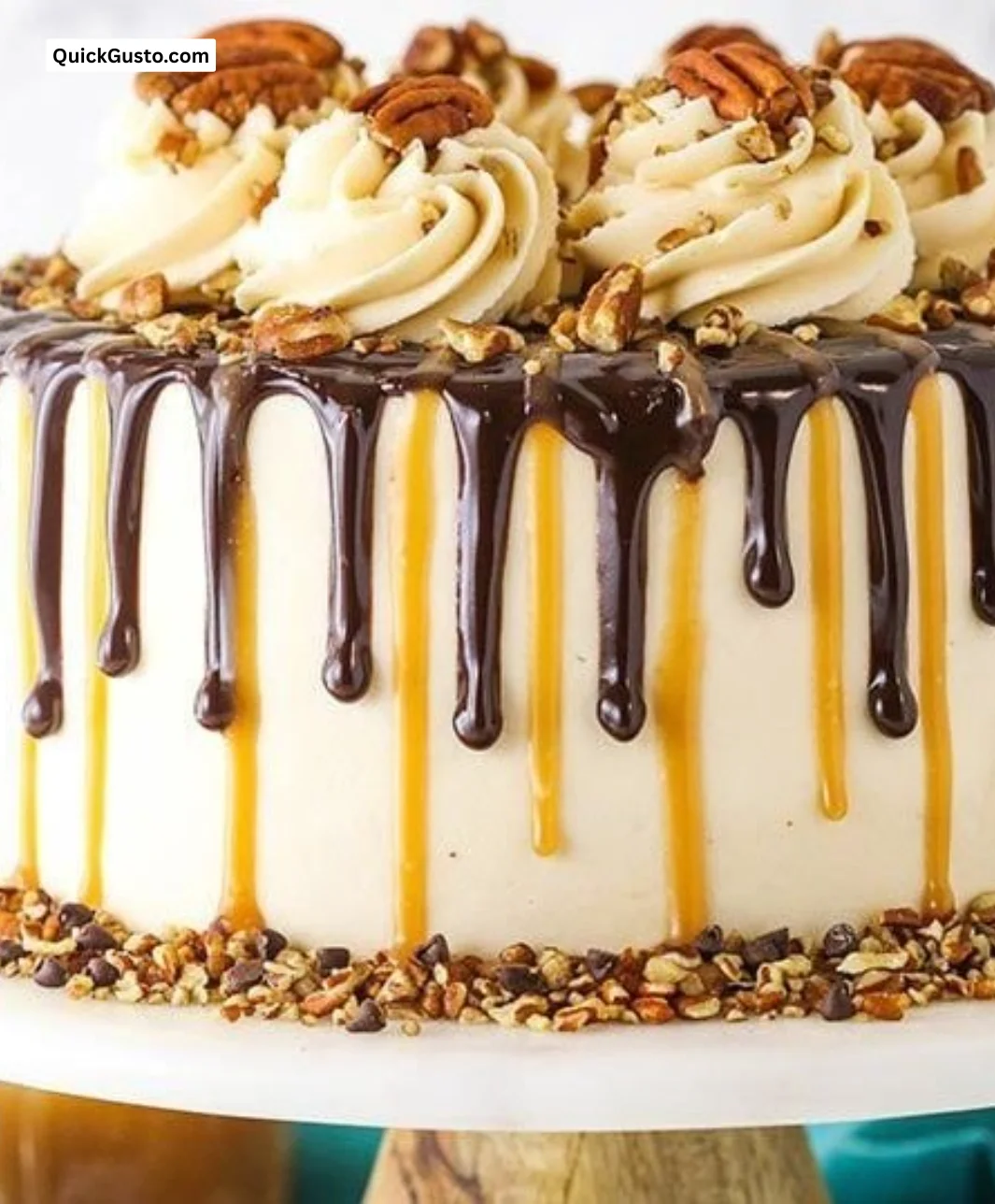Decadent Turtle Chocolate Layer Cake with chocolate frosting and caramel drizzle.